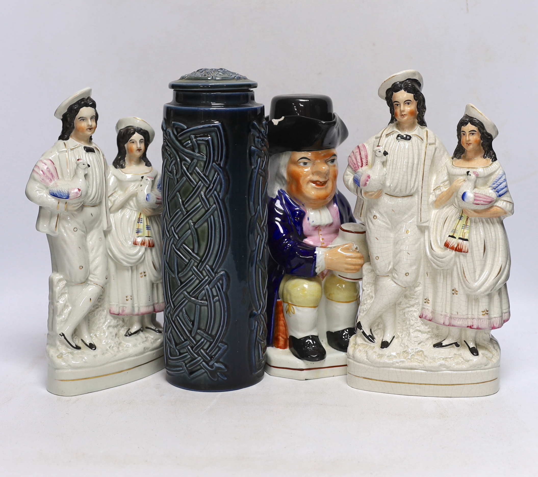 Two Staffordshire groups, toby jug and an Irish jar and cover, 29cm